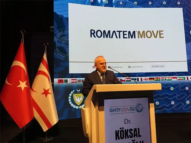 Dr. Köksal Holoğlu speaking at the announcement
